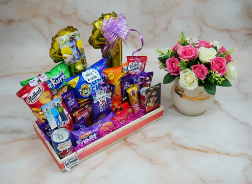 Anniversary Gift Hamper for Couples 2 Shop an anniversary gift hamper for couples featuring chocolates, treats and a beautiful decorative presentation. A thoughtful anniversary gift for husband, wife or couples.