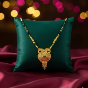 Gold Plated Traditional Mangalsutra for Women Gold plated traditional mangalsutra for women with an ornate pendant and black-bead chain