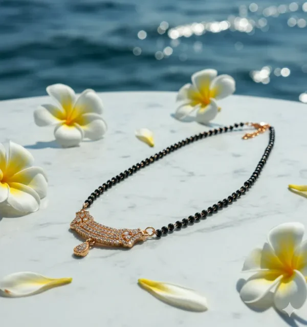 Rose Gold Plated Mangalsutra for Women Rose gold plated mangalsutra for women with a stone-studded pendant and black-bead chain